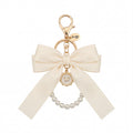 BOW AND PEARL KEYCHAIN CHARM IVORY WHITE